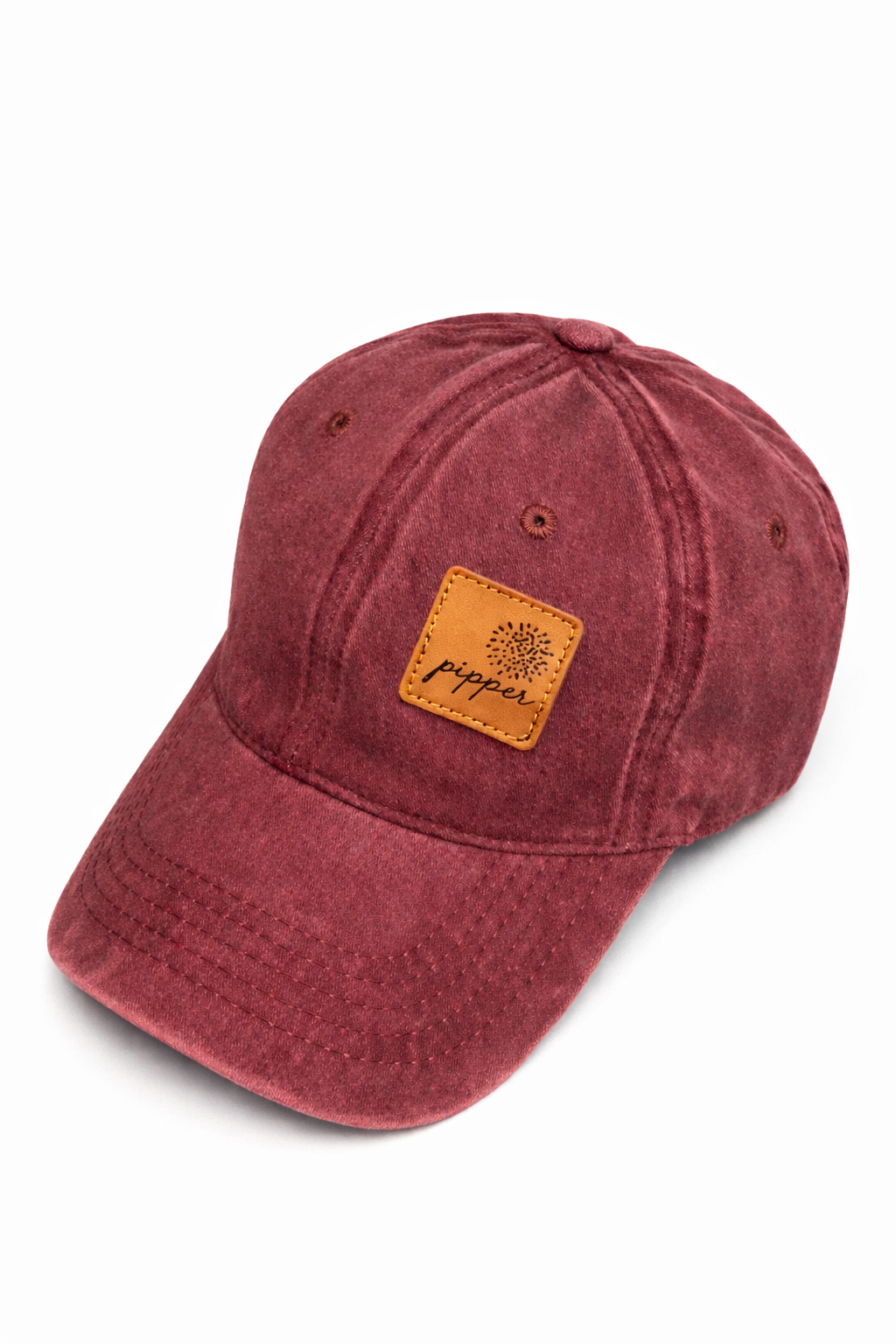 Gorra Origin burdeos con parche de piel